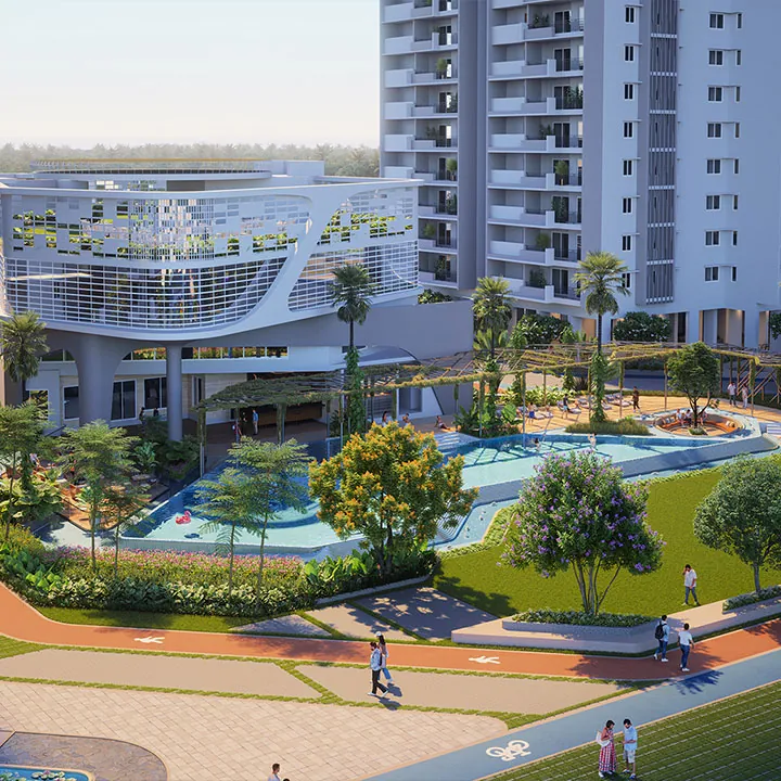 The central park with lawns, pools and a cycle track in front of a clubhouse